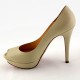 Scarpe beige con tacco alto aperte in punta